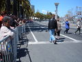 A section of the southbound lanes of The Embarcadero just south of the crosswalk directly in front of the Ferry Building, facing north