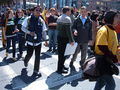 People heading north along the northbound lanes of The Embarcadero