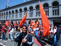 People and pro-Chinese protesters in front of the Ferry Building