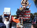 A pro-Tibet (left) and Iraq War protester at the entrance to Justin Herman Plaza on Market Street