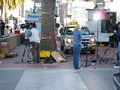 Reporters filing reports across from the Ferry Building and next to Justin Herman Plaza just before 17:00